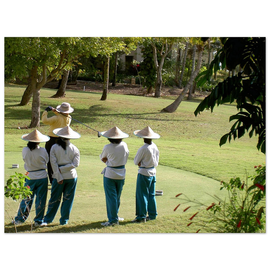 Bali au Nirwana Bali Golf Club, le joueur et ses caddies.