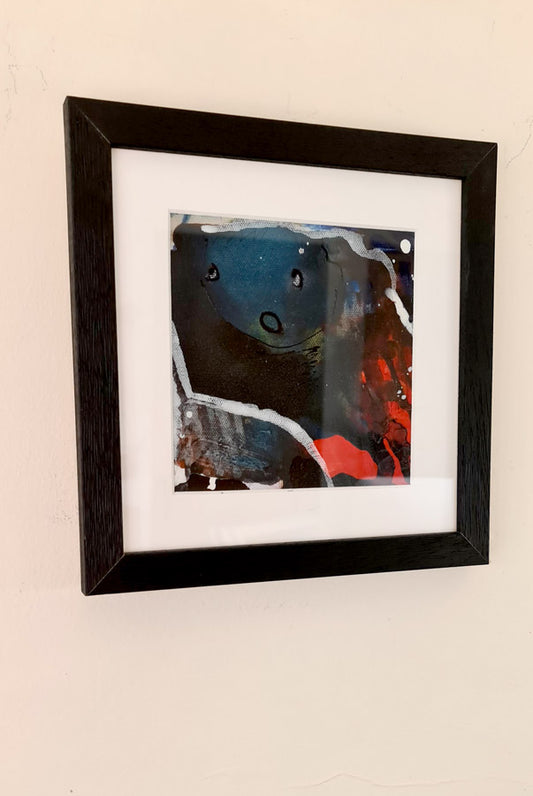 peinture abstraite bleue et rouge encadrée