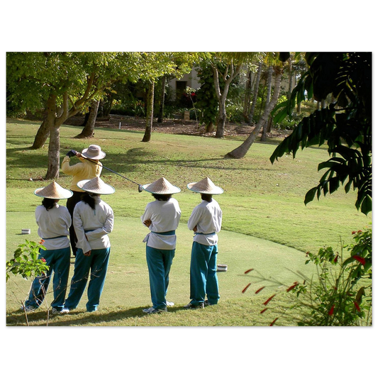 Bali au Nirwana Bali Golf Club, le joueur et ses caddies.